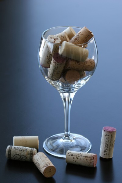 placecards - corks in glass on table
